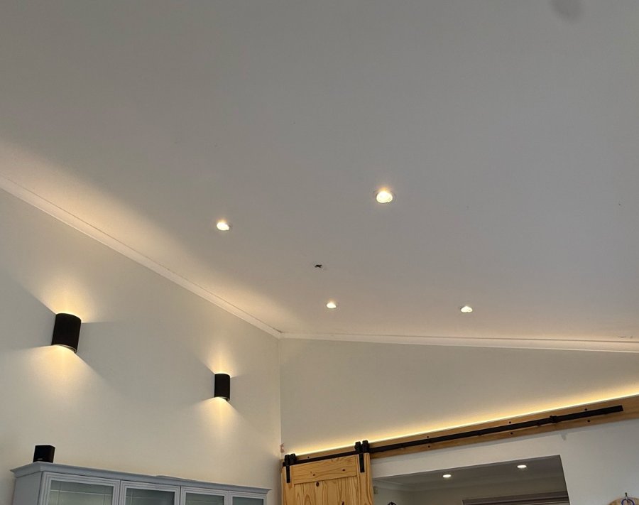 New LED downlights, wall lights and LED strip lighting in a Berkeley Vale lounge room