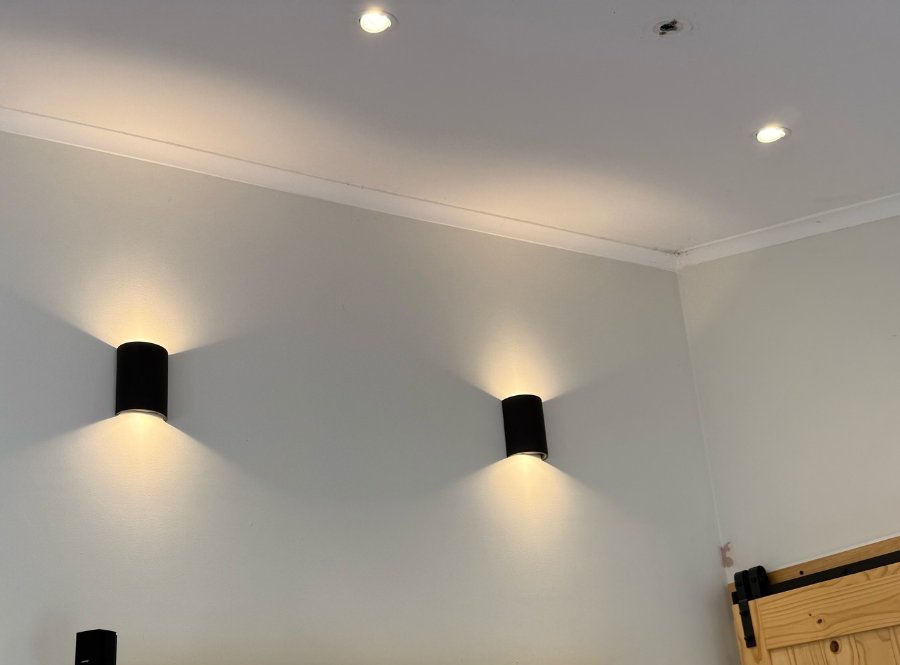 New up-and-down LED wall lights in a Berkeley Vale lounge room